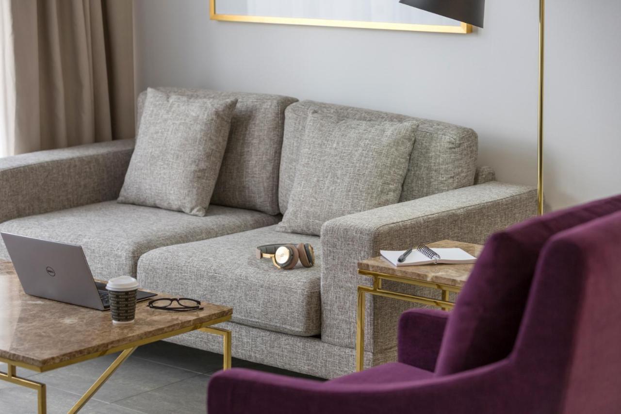 Meriton Suites Pitt Street, Sydney Eksteriør billede A sofa