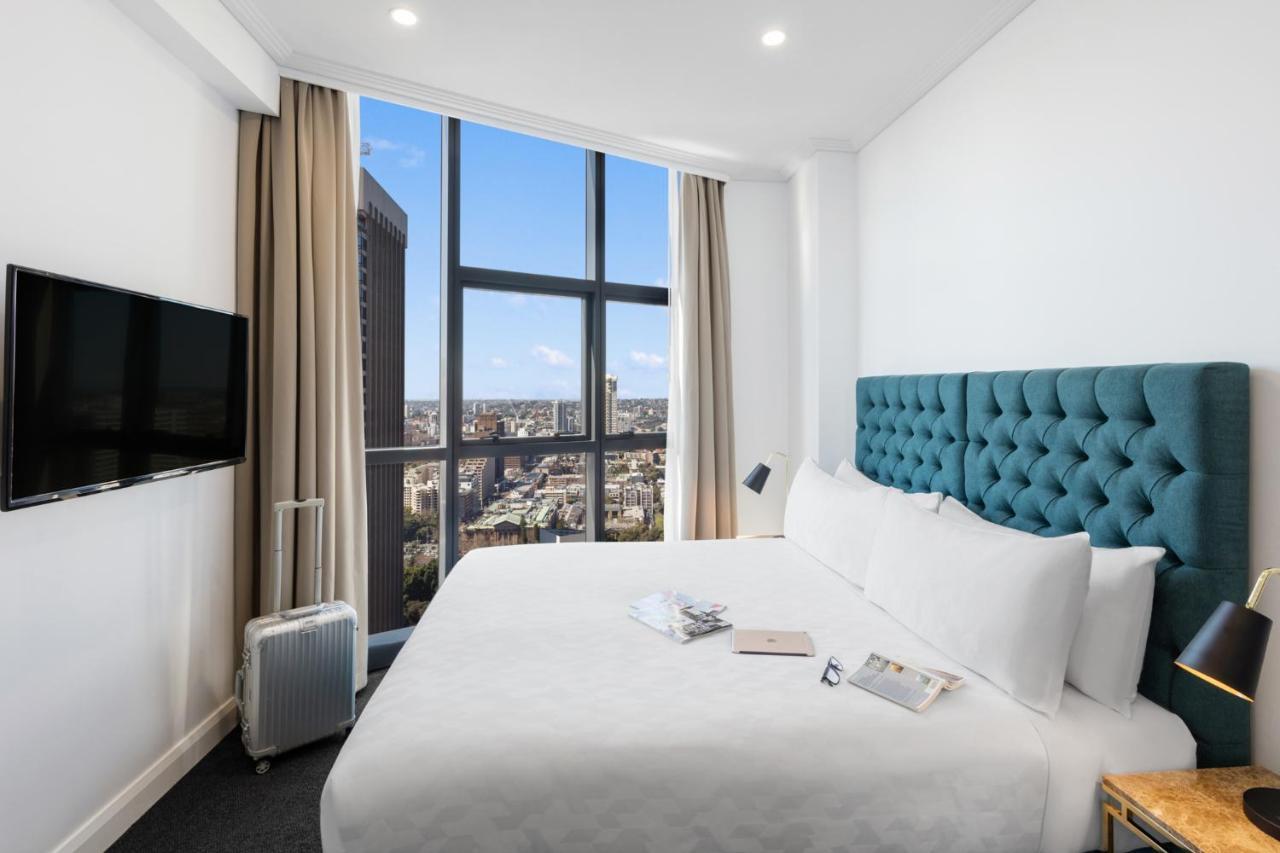 Meriton Suites Pitt Street, Sydney Eksteriør billede A bedroom at the hotel