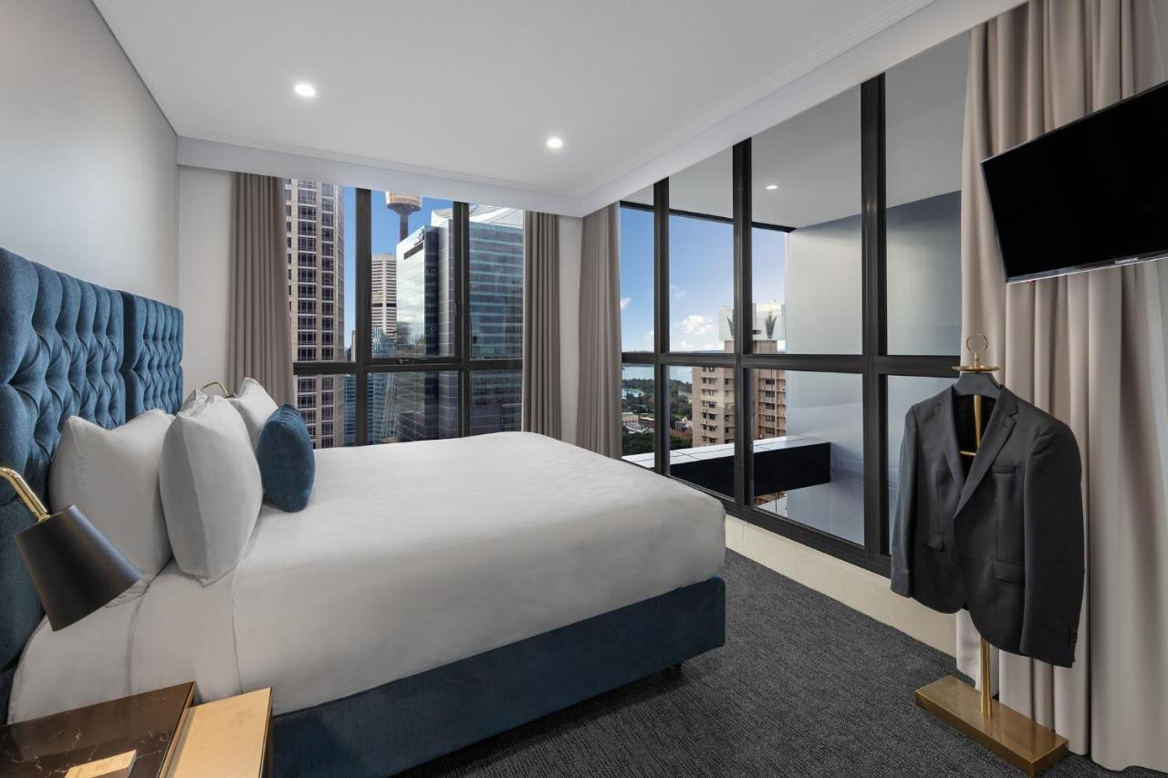 Meriton Suites Pitt Street, Sydney Eksteriør billede A bedroom at the hotel