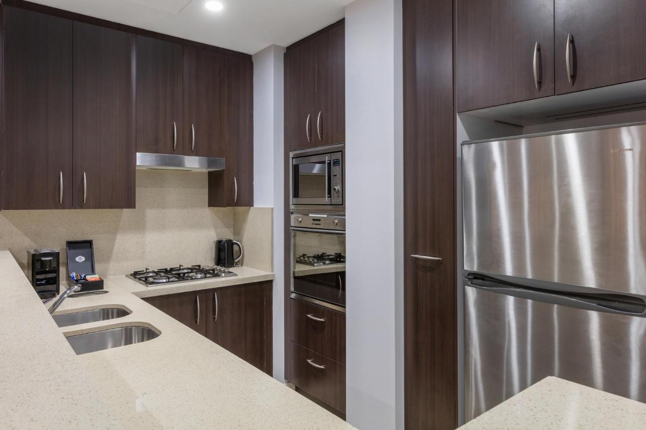 Meriton Suites Pitt Street, Sydney Eksteriør billede A kitchen in a typical apartment